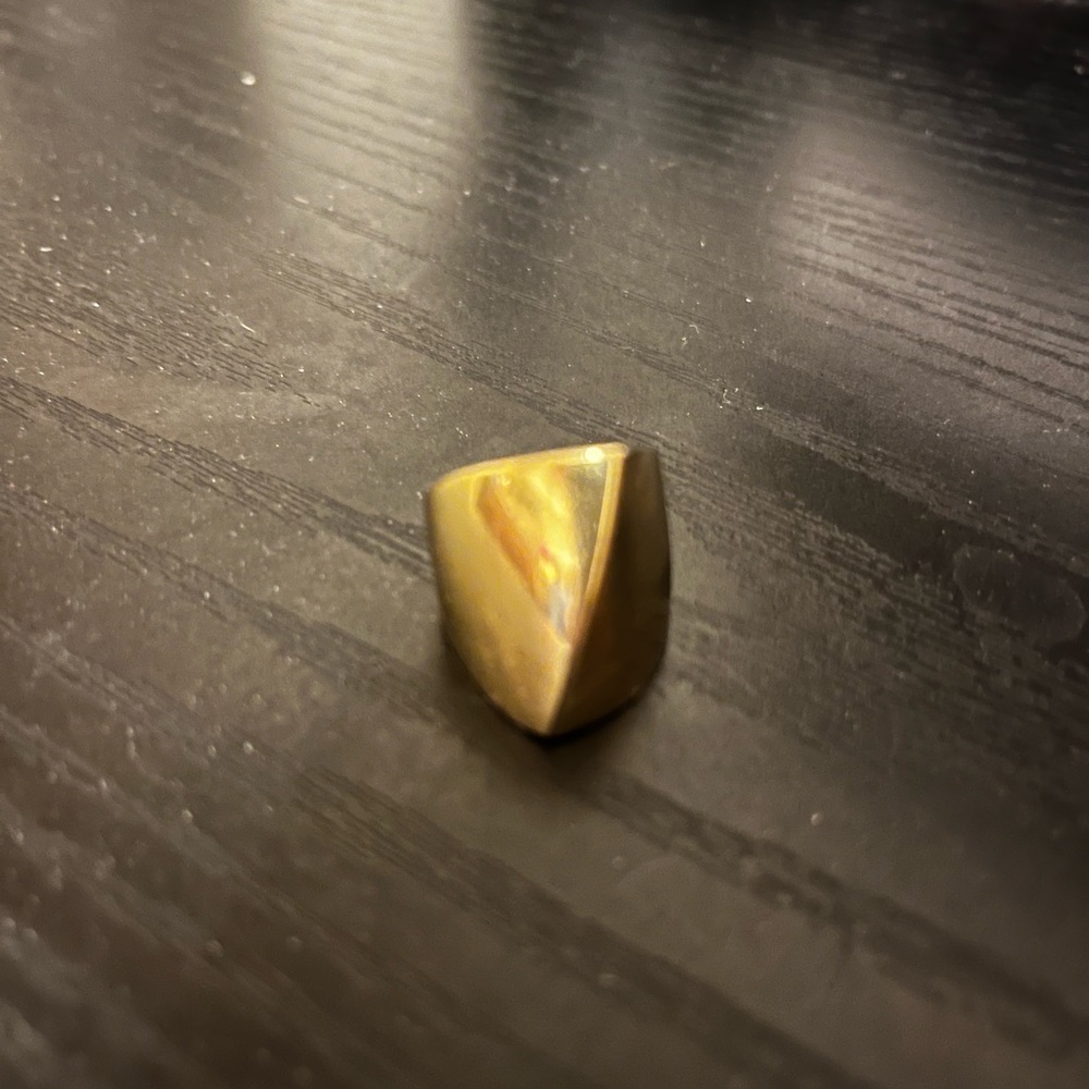 14 karat yellow gold tapered, polished dome ring size 7